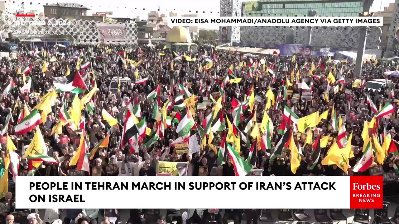 People In Tehran March In Support Of Hezbollah And Iran's Missile Attack On Israel