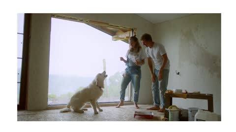 A Happy Family Dancing With Their White Dog 1 😀😀