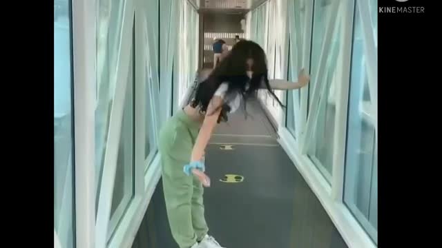 Beautiful dancing girl on the metro station.