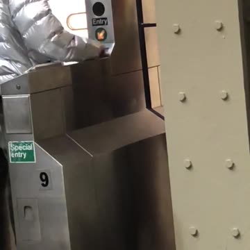 Guy swipes subway card but doesn't work