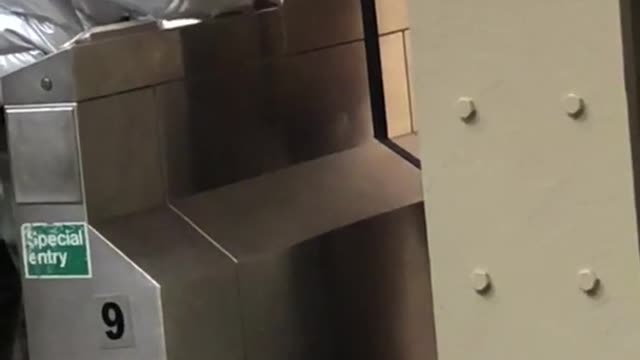 Guy swipes subway card but doesn't work