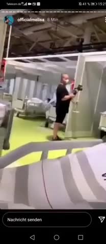 Woman says that she's being paid for pretending she has covid.