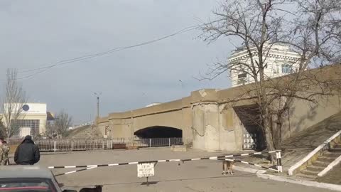 Russian attack helicopters flying over the Kakhovka Hydroelectric Power Plant