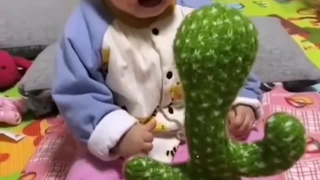 Baby Reacts to Dancing Cactus Video #funny