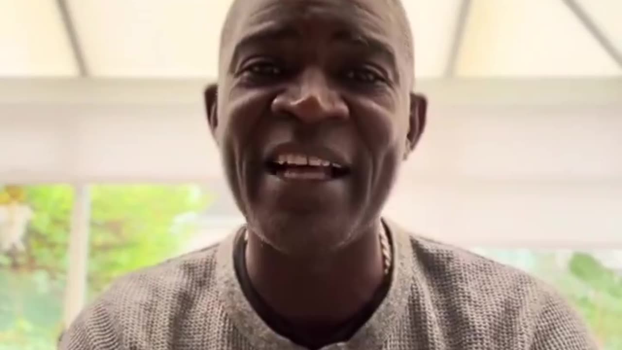 African man is angry because more money is spent in the north of Ireland