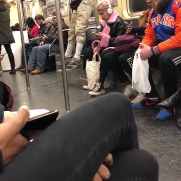 Old man black fanny pack pull ups on subway