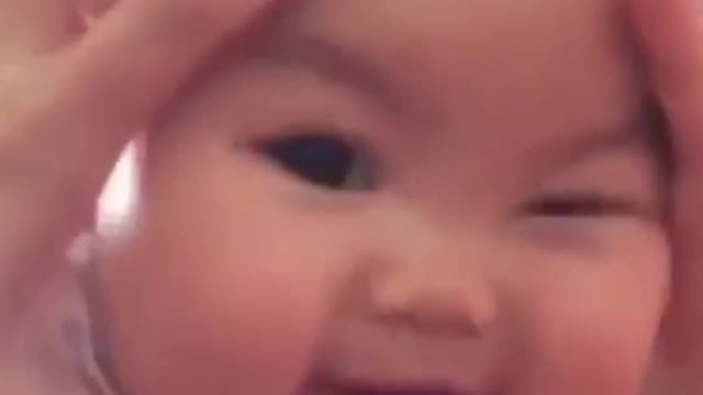 Baby's face is like a round moon