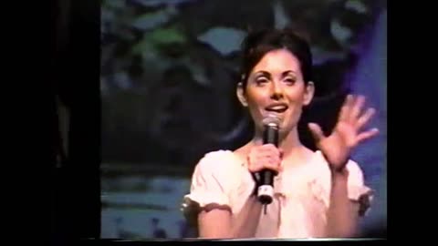 Adrienne Wilkinson on stage at the 2003 Xena Con