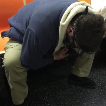 Sunglasses guy does karate man spread on subway