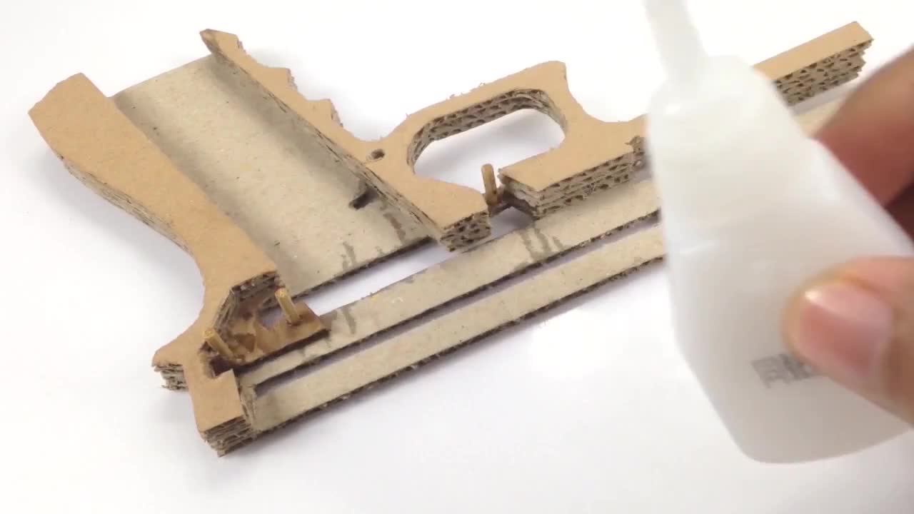 A pistol glued with glue