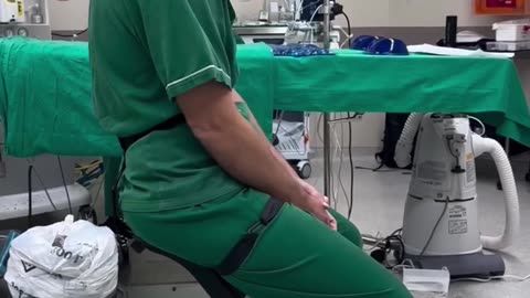 Doctor Uses Wearable Chair in the Operating Room