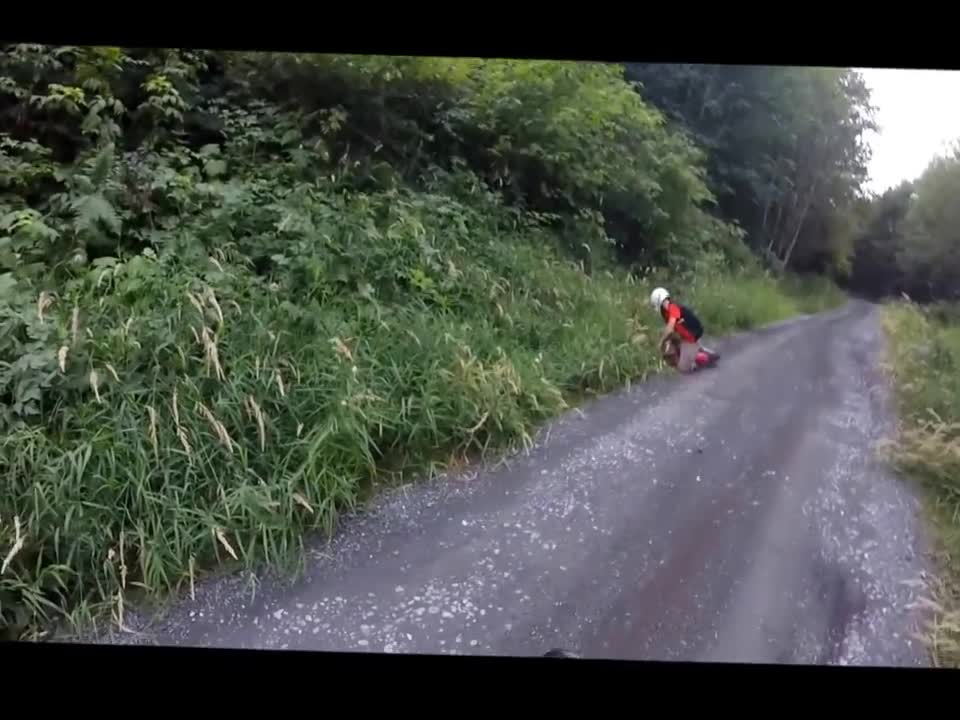 Road dirtbike faceplant on gravel