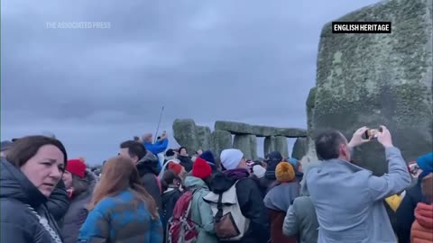 Northern hemisphere's shortest day marked at Stonehenge on winter solstice