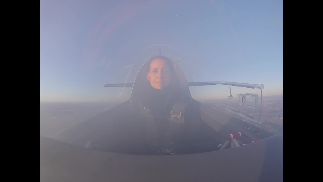 Smoke completely fills cockpit of stunt plane during flat spin