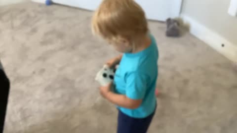 Baby playing xbox.