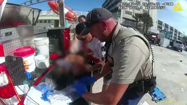 Bodycam video shows chaos after car drives onto Daytona Beach, injures child