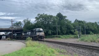 Happy Train Engineer Throws Gift to Railfan