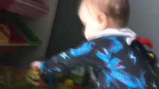 Kiddo Uses Forehead for Hammer Practice
