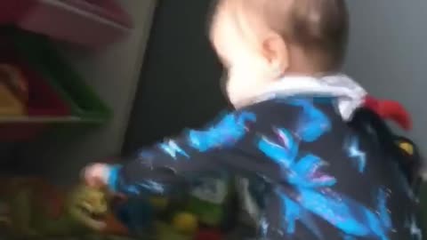 Kiddo Uses Forehead for Hammer Practice