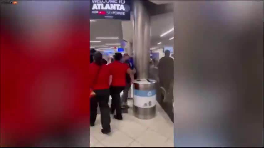 CHAOS TAKES PLACE ATLANTA AIRPORT: EMPLOYEE IS CLOCKED BY MAN ESCORTED OFF FLIGHT