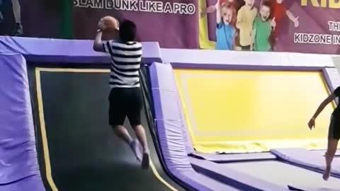 Even with trampoline hops he can't dunk. Cmon!