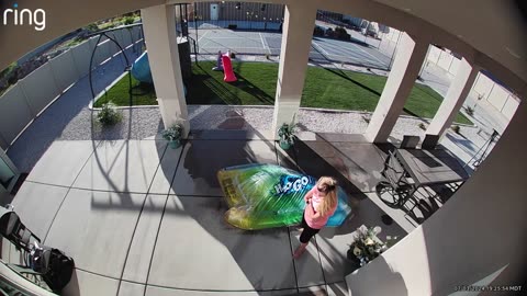 Woman Tries to Move a Splash Pad and Ends Up Flying Backwards