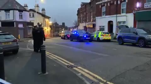 Armed police attended asylum hotel Birkenhead near Liverpool as a man threatened people with a knife