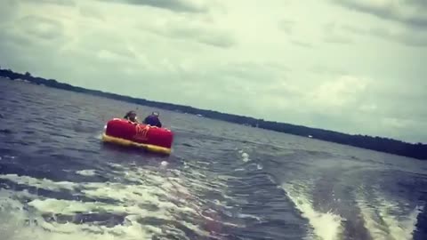 Collab copyright protection - two guys red tubing flips wipeout