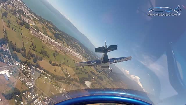 Aerobatic pilots draw giant heart in the sky