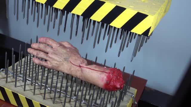 100 TON PRESS WITH NAILS VS THE HAND