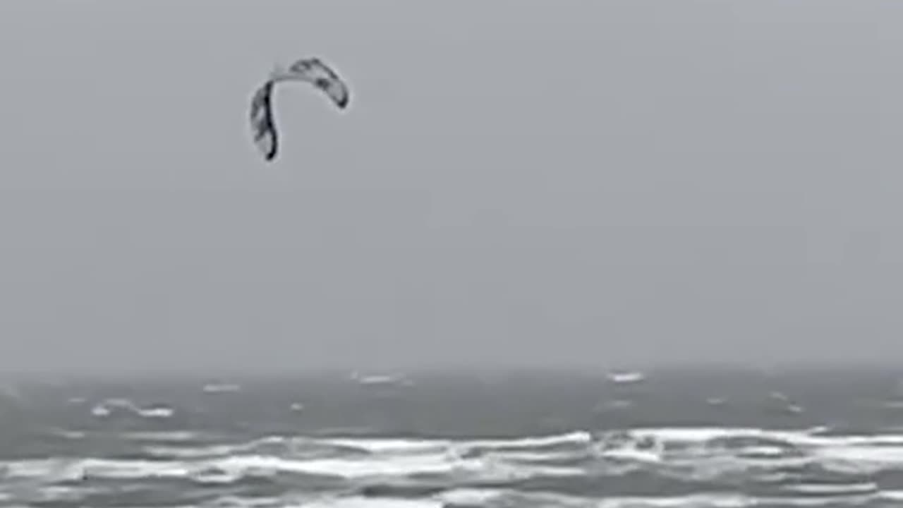 Storm Bert: Person does some EXTREME wind surfing on turbulent waves