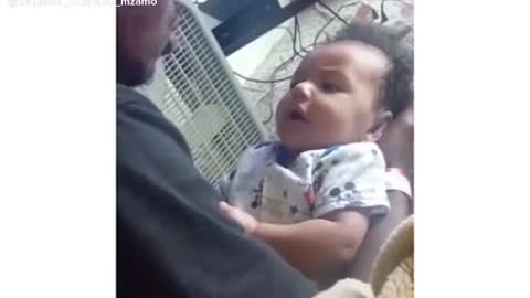 Toddler saying I love you to his dad