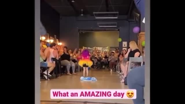 Child dressed in drag performs in Omaha brewery