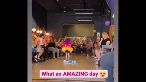 Child dressed in drag performs in Omaha brewery