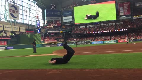 Police dancing with the mascot