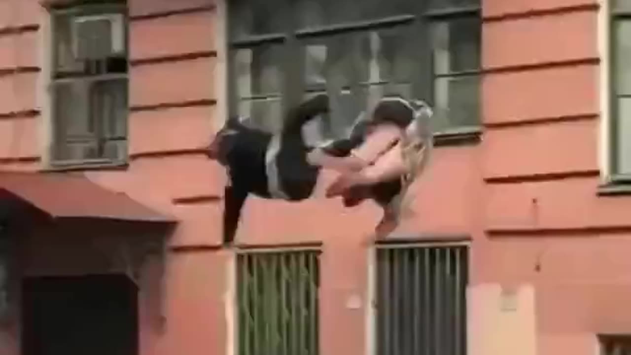 Fighting couple fall from third story balcony