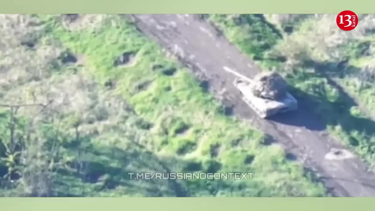 Drone footage of Russian fighters attacking with Chinese-made vehicles and infantry