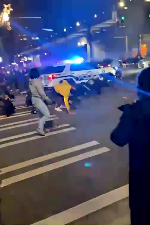 Tacoma Police Vehicle Driving Over Crowded People In The Street