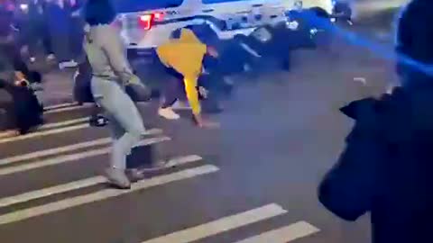 Tacoma Police Vehicle Driving Over Crowded People In The Street