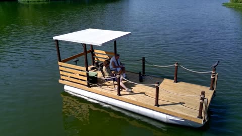 Marjie and Steve on the DIY pontoon