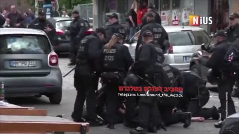 German police shooting down a man who try to kill Holland fans with an axe