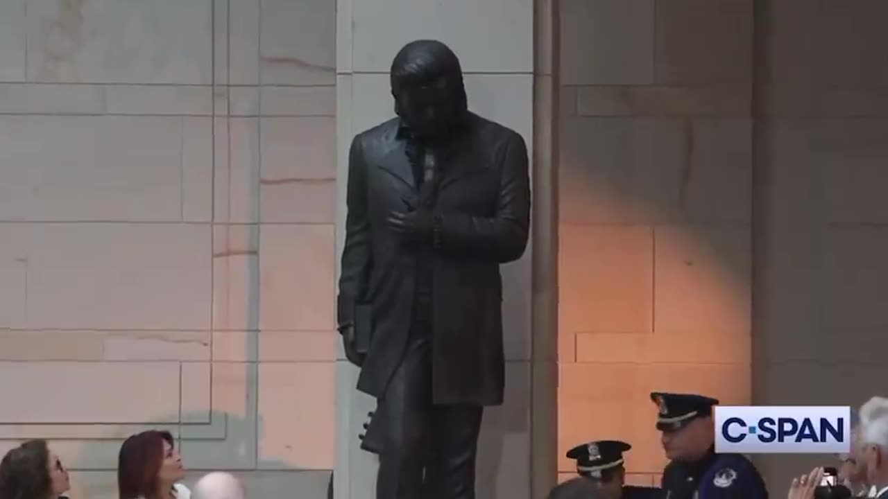 Statue of Johnny Cash holding a Bible unveiled in the U.S. Capitol.