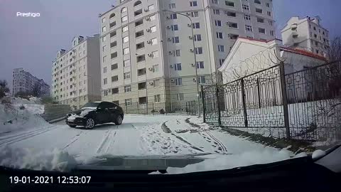 Quick Thinking Driver Reverses Away from Sliding Car || ViralHog