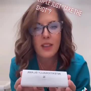 Pharmacist shows blank sheet for Jab