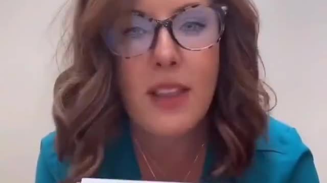 Pharmacist shows blank sheet for Jab