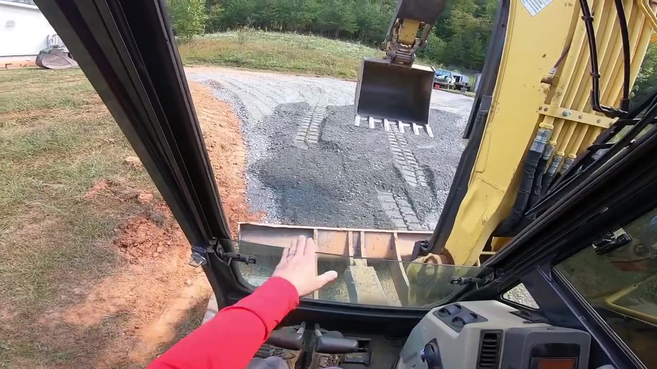 Excavator grading road bond