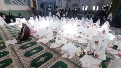 Muslim girls praying