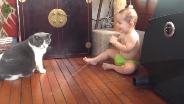 Cute 🥰 baby playing your cute cat 😸😸 and very happy and enjoy 💐💐