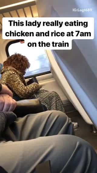 This lady really eating chicken and rice at 7am on train