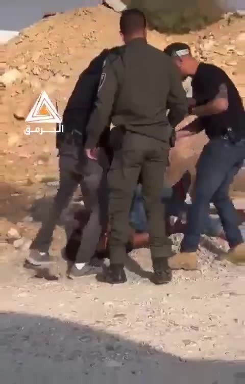 Israeli forces brutally assaulting a young Palestinian man